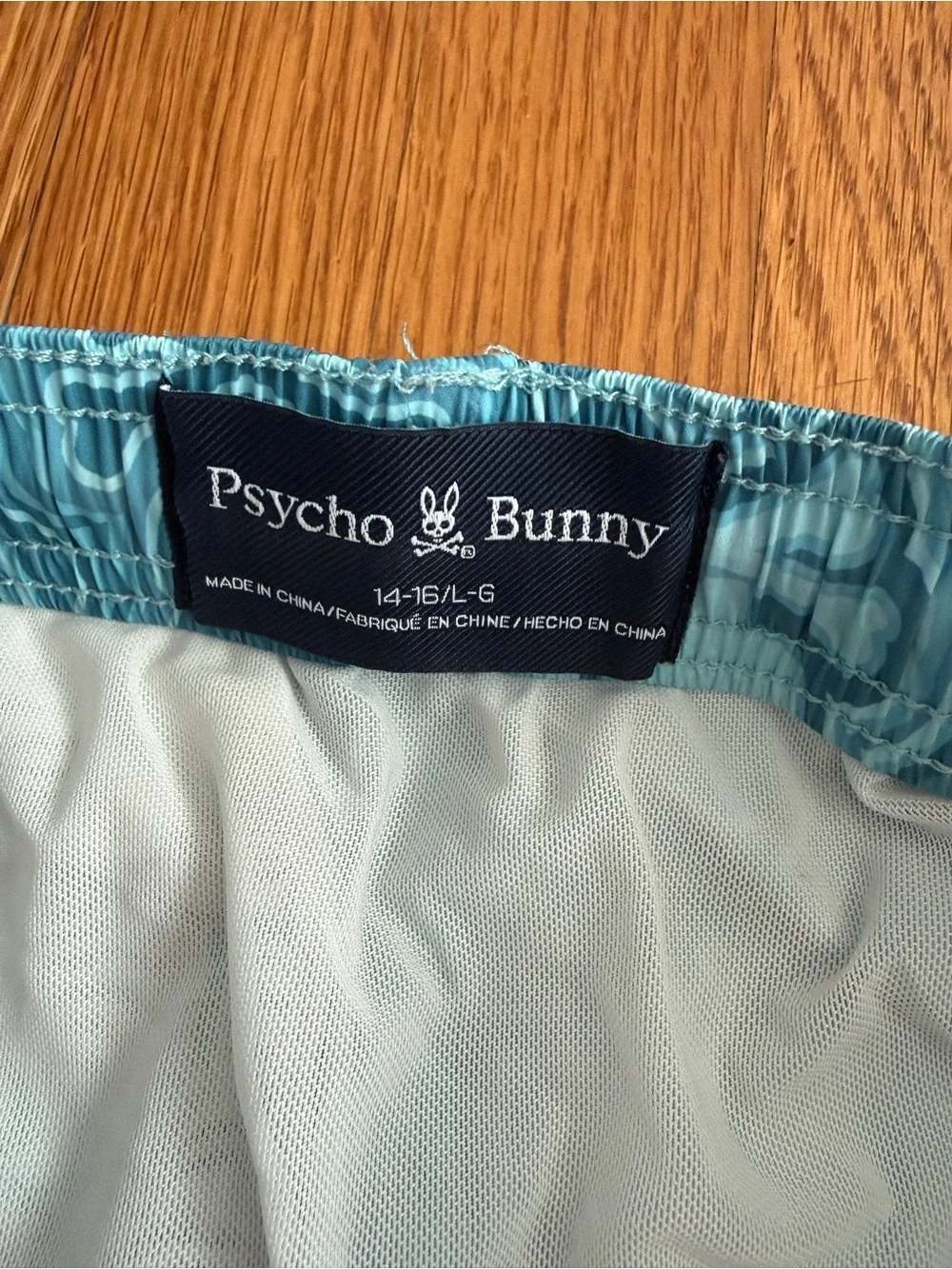 Psycho Bunny blue bunny logo beach swim trunks L 14/16